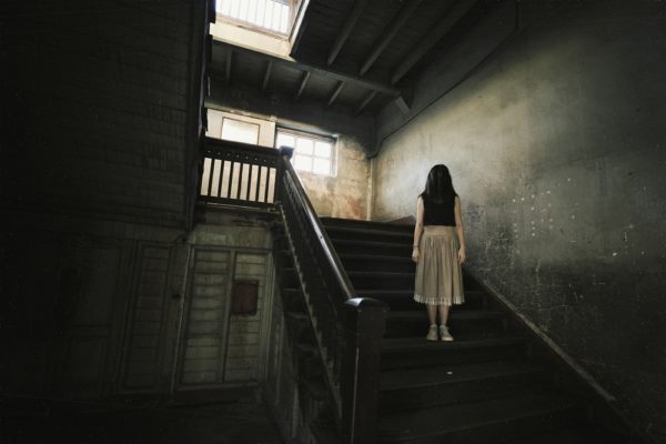 creepy girl on stairs